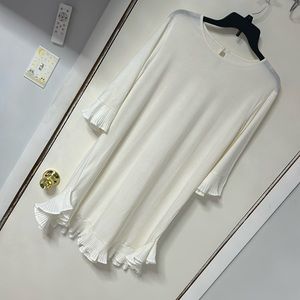 White Dress with ruffled sleeves/bottom